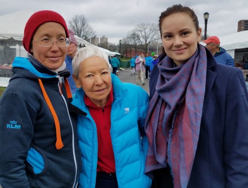 Ms. Konyakina (right) with Pratishruti Khisamoutdinova (center), the oldest participant from the Russian Federation.